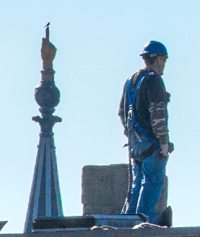 Workers On Rooftop